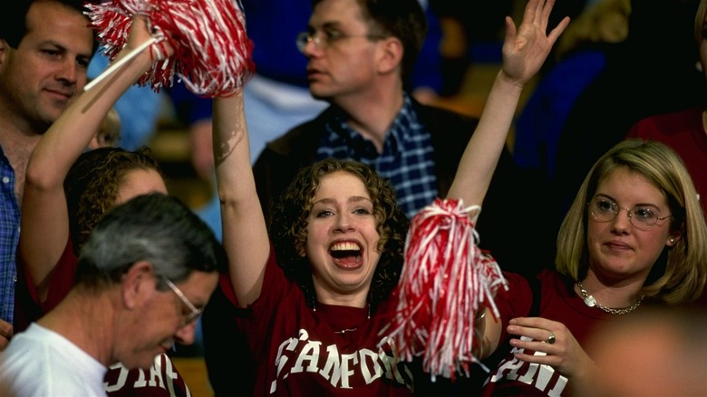 Chelsea Clinton in a Stanford shirt celebrating