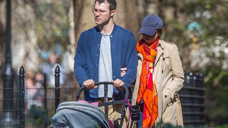 Chelsea Clinton and Marc Mezvinsky push a stroller