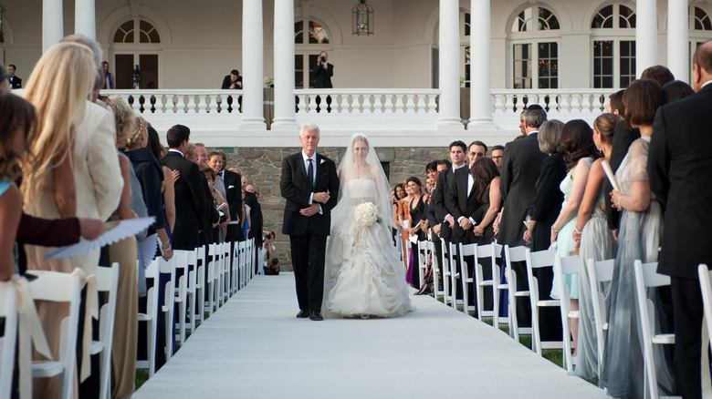 Bill Clinton walking Chelsea Clinton down the aisle