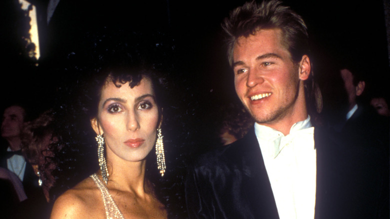 Cher and Val Kilmer at an event in the 1980s