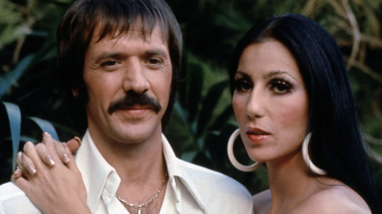 Cher and Sonny Bono posing for promotional photos together