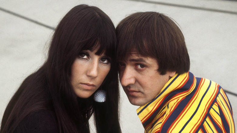 Sonny and Cher posing for promotional photos together