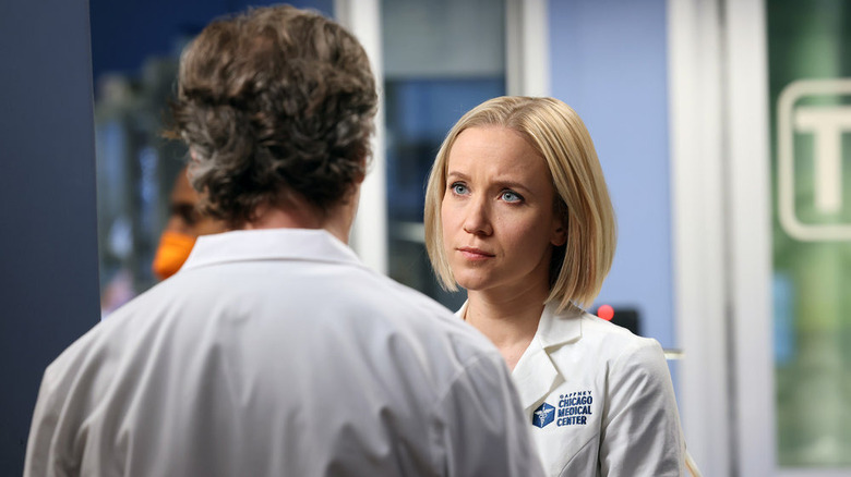 Jessy Schram talking with a doctor in Chicago Med