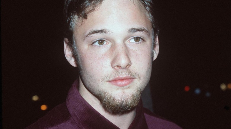 Brad Renfro standing outside