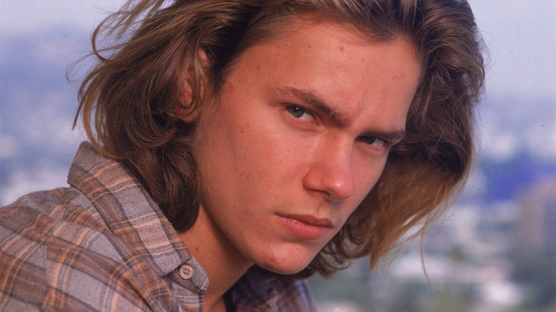 River Phoenix posing