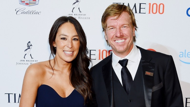 Chip and Joanna Gaines smiling at an event