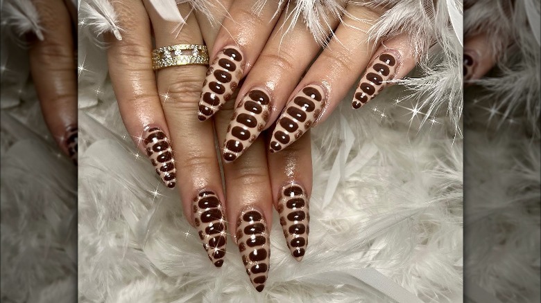 Chocolate python pointy nails manicure