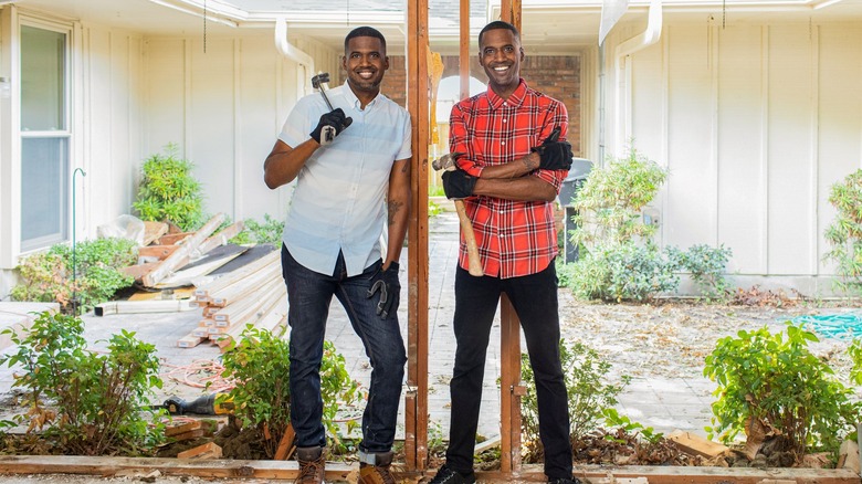 Chris and Calvin LaMont holding tools