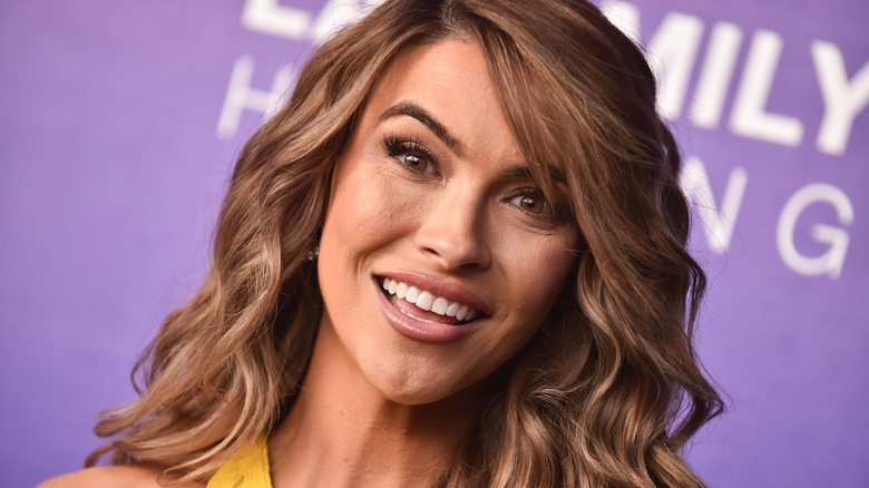 Chrishell Stause laughing on red carpet