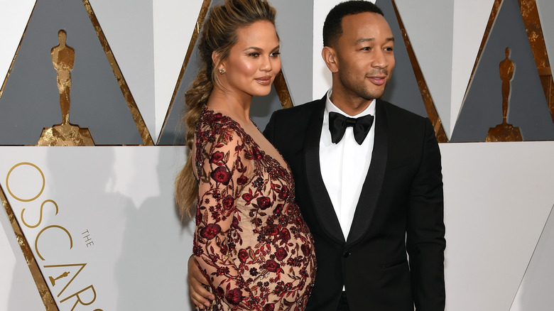 Chrissy Teigen pregnant on red carpet