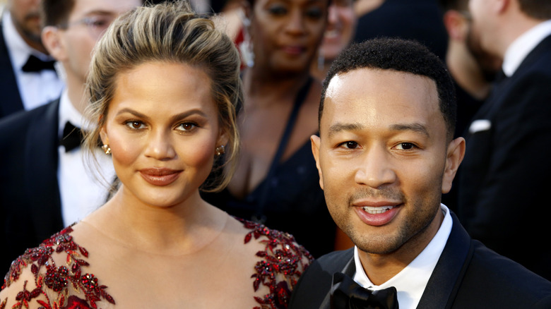 Chrissy Teigen and John Legend at event