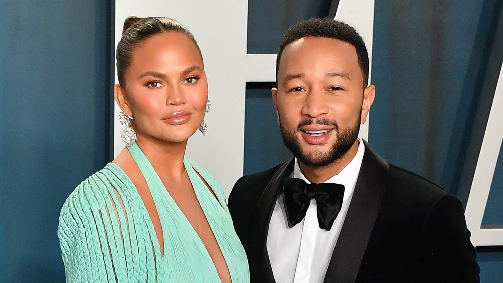 Chrissy Teigen and John Legend at an event