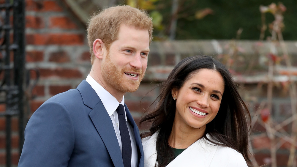 Meghan Markle and Prince Harry smiling