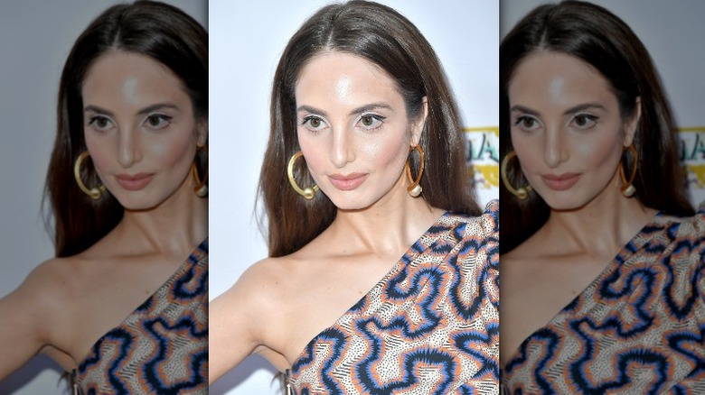 Close up of Alexa Ray Joel wearing gold hoops