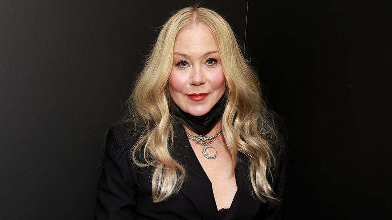 Christina Applegate wearing black dress and jeweled necklaces at the 2023 Critics Choice Awards