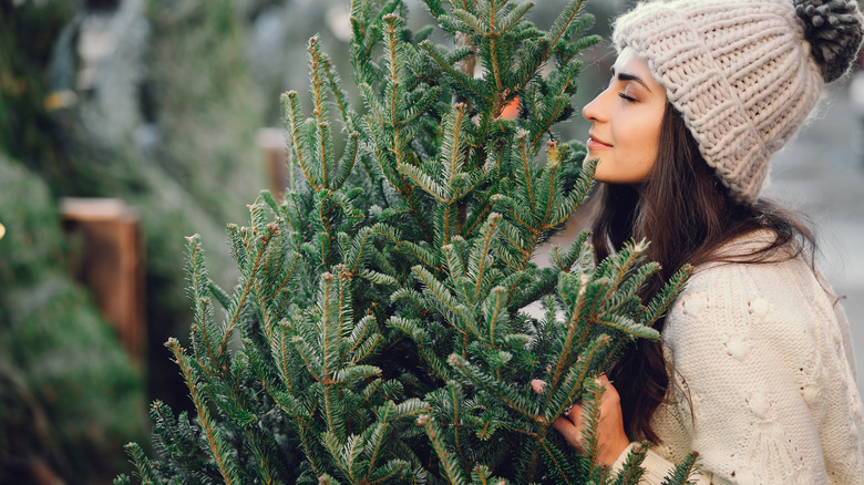 Woman buying a Christmas tree