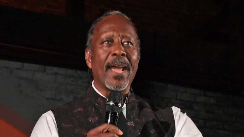 Clarke Peters onstage with microphone