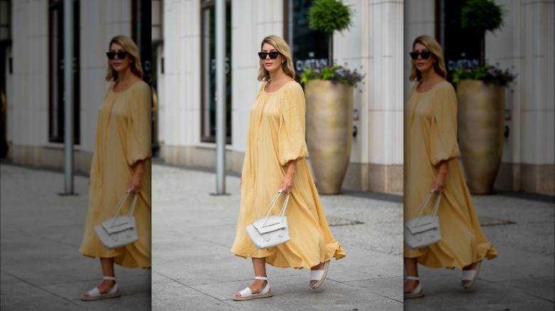 woman walking wearing espadrille sandals 