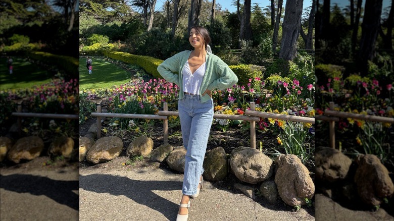 Dainty blouse worn with jeans and white clogs