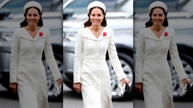 Kate Middleton walking in white coat