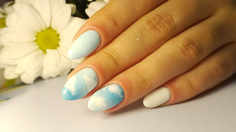 Blue and white cloud nails