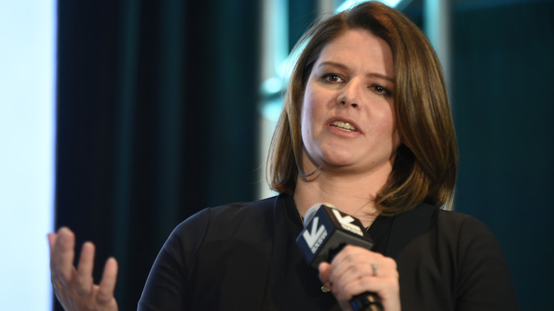 Kasie Hunt holding microphone