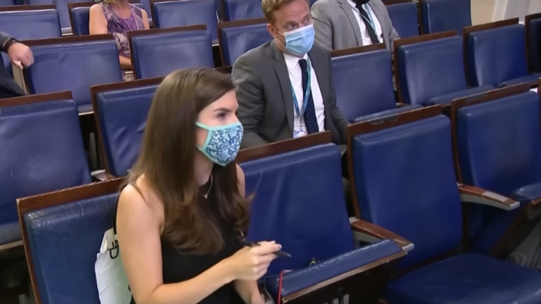 Kaitlan Collins wearing a mask