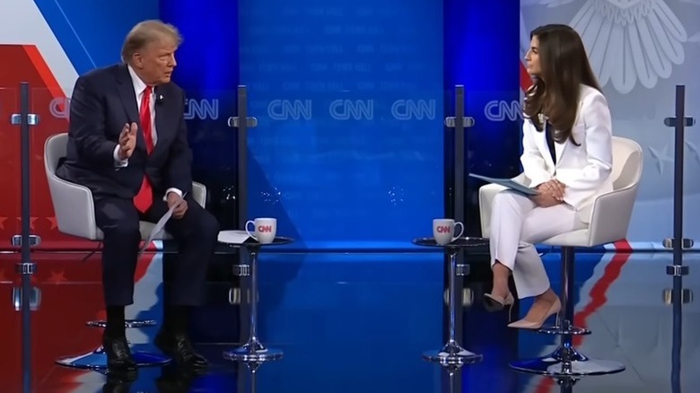 Donald Trump and Kaitlan Collins on stage