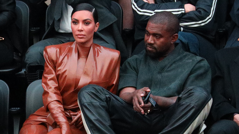 Kim Kardashian and Kanye West sitting together