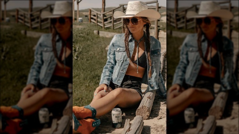 woman in all denim, wearing cowboy boots