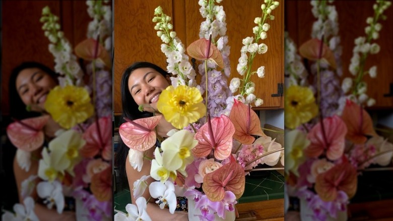 Woman with huge bouquet of flowers