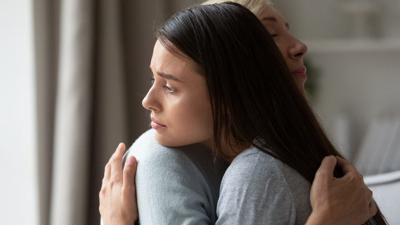 Two women hugging