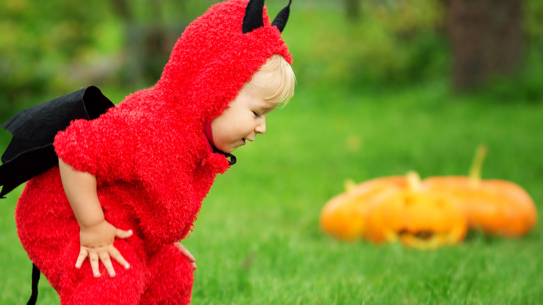 baby in devil costume