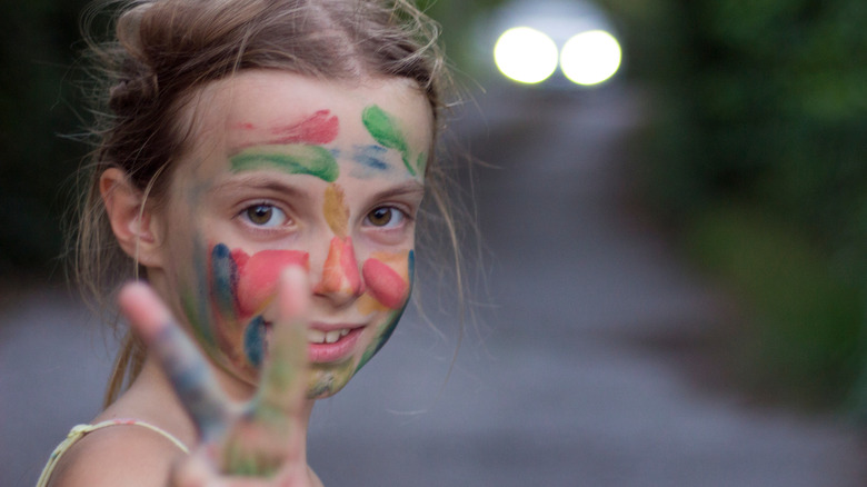 young girl with painted face