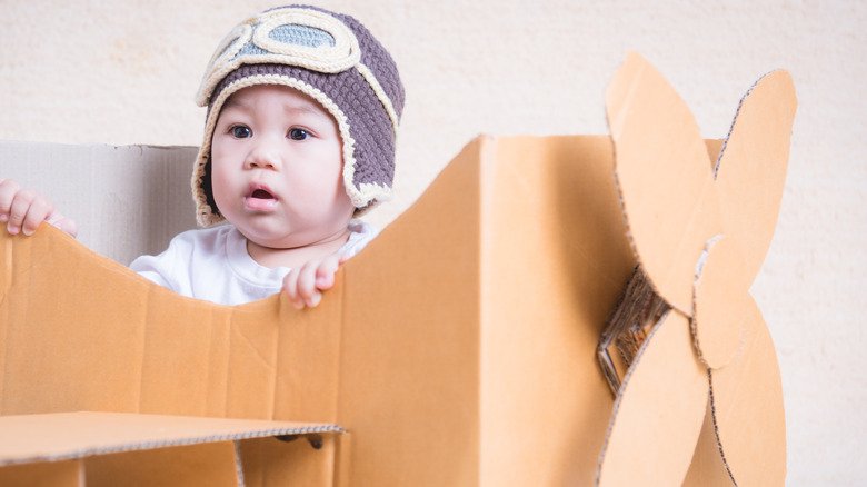 baby dressed as pilot