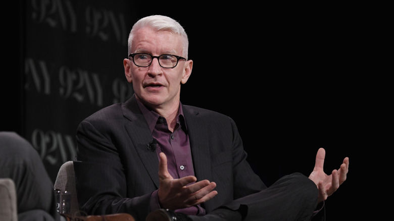 Anderson Cooper speaking at a panel event