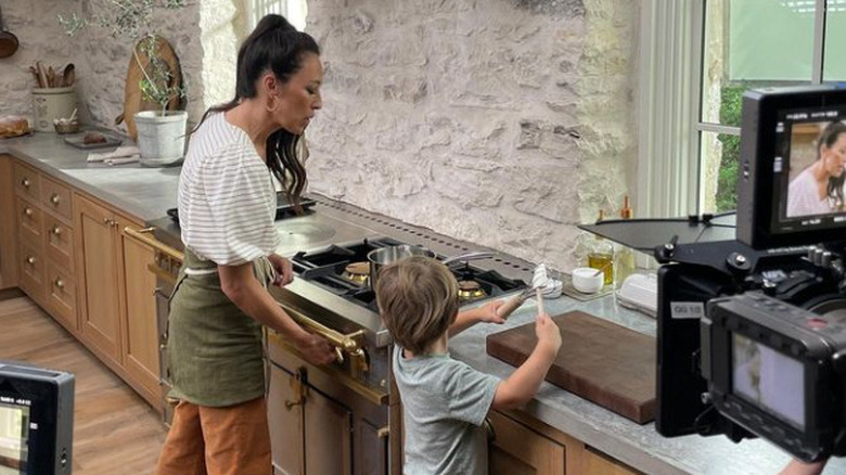 Joanna Gaines cooking with her son