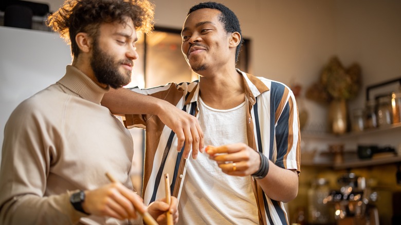 Two men cooking in the kitchen