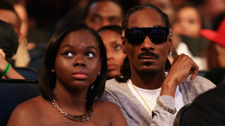 Cori Broadus and Snoop Dogg posing