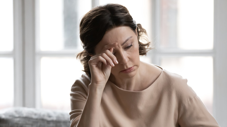 woman looking stressed