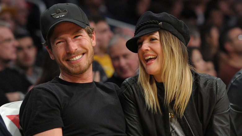 Drew Barrymore and Will Kopelman laughing