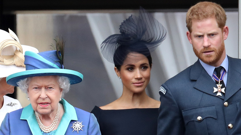 The Queen, Meghan Markle, and Prince Harry at Buckingham Palace