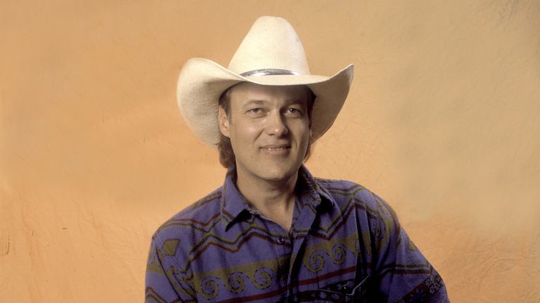 Ricky Van Shelton smiling in a cowboy hat