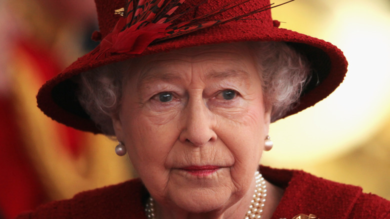 Queen Elizabeth II in red