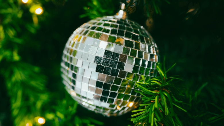 Disco ball hanging in Christmas tree