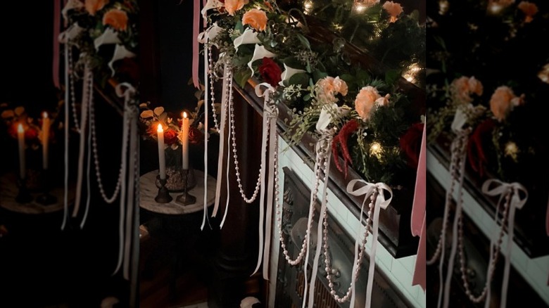 Roses, ribbons, pearls on mantel