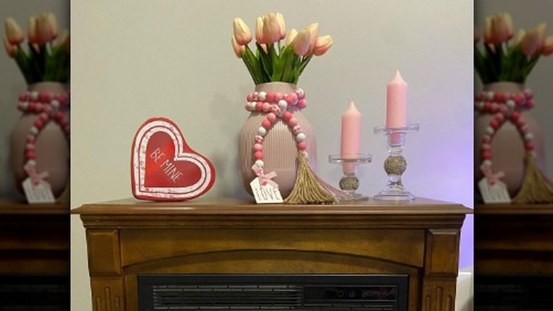 Heart pink candles fireplace