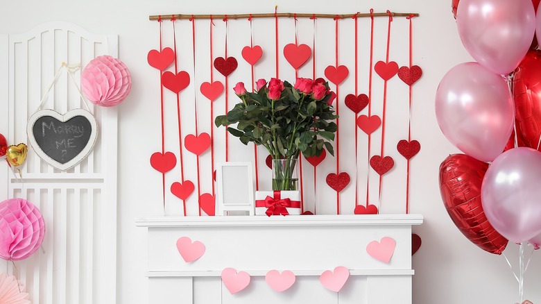 https://www.thelist.com/img/gallery/creative-ways-to-decorate-your-mantel-for-valentines-day/intro-1674992779.jpg