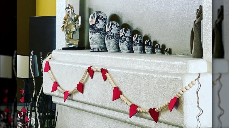 nesting dolls heart fireplace mantel