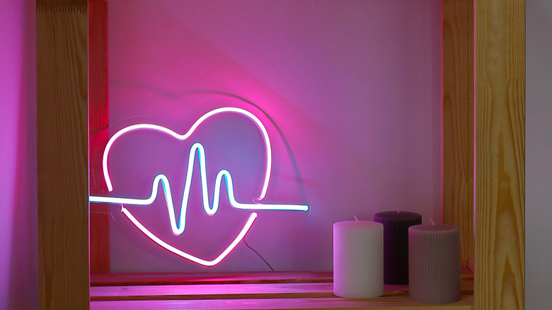 Pink heart-shaped neon wall sign